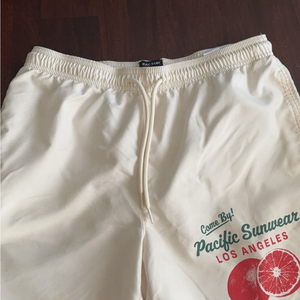 PacSun Cream Shorts with Red Graphic
